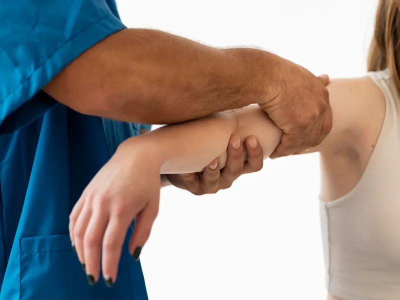 Chiropractic care for elbow pain at The Creek Chiropractic & Wellness in Battle Creek